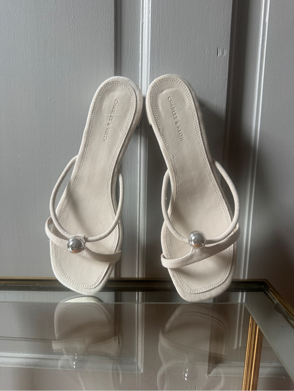 Charles & Keith Cream Slide Sandals with Silver Orb Detail